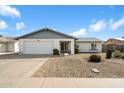 Charming single-story home with a well-maintained front yard and attached garage at 2801 N Dakota St, Chandler, AZ 85225