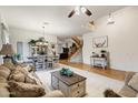 Spacious living room featuring a high ceiling, hardwood floors and carpet and lots of natural light at 3017 S Mesita --, Mesa, AZ 85212