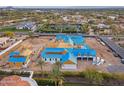 Aerial view of a new home under construction showcasing framing, roof and surrounding properties at 6001 N 37Th Pl, Paradise Valley, AZ 85253