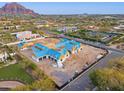 Aerial view of a new home under construction showing the roof, framing, and scenic views at 6001 N 37Th Pl, Paradise Valley, AZ 85253