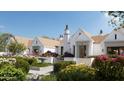 Inviting home with well-maintained garden, fountain and stone walkway to front door at 6001 N 37Th Pl, Paradise Valley, AZ 85253