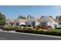 Attractive single-story home featuring a perfectly landscaped yard with colorful flowerbeds at 6001 N 37Th Pl, Paradise Valley, AZ 85253
