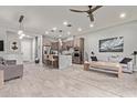 Open-concept living space with a kitchen island and neutral color palette, flowing layout, and modern finishes at 7324 E Vista Bonita Dr, Scottsdale, AZ 85255