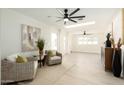 Bright living room with neutral colors, modern decor, and wood-look flooring at 120 W Thunderbird Rd, Phoenix, AZ 85023