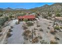 Expansive desert property with a charming home, desert landscaping, and mountain vistas at 30066 N Holly Dr, San Tan Valley, AZ 85144