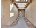 Inviting entryway with stone accents, decorative accents, and a view of the front door at 325 W Seaside Dr, Casa Grande, AZ 85122
