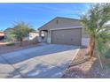 Charming single-story home with a well-maintained front yard and covered porch at 35285 W San Pedro Dr, Maricopa, AZ 85138