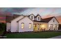 Stunning home exterior featuring an arched entryway and a well-maintained lawn at 3634 N 47Th St, Phoenix, AZ 85018