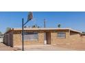 Single-story brick home showcasing tidy windows and a well-kept exterior at 3644 W Townley Ave, Phoenix, AZ 85051