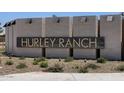 Hurley Ranch community entrance sign surrounded by desert landscaping and greenery at 3819 S 87Th Dr, Tolleson, AZ 85353