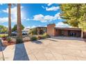 A charming property with desert landscaping and a spacious driveway at 945 W 10Th St, Mesa, AZ 85201