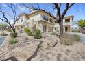 Beautiful condo featuring a private two-car garage and charming desert landscaping at 16800 E El Lago Blvd # 2072, Fountain Hills, AZ 85268