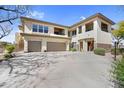 Inviting condo with a two-car garage, spacious driveway, and attractive desert landscaping at 16800 E El Lago Blvd # 2072, Fountain Hills, AZ 85268