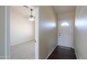 Inviting entryway with a tiled floor and a view into the carpeted living space at 1753 E Shasta St, Casa Grande, AZ 85122