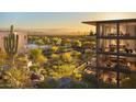 Exclusive community offering resort-style living with lush landscaping, a sparkling pool, and multi-story homes with balconies at 5000 N Camelback Ridge Rd # 410, Scottsdale, AZ 85251