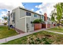 Exterior shot of townhomes featuring well maintained landscaping at 510 N Alma School Rd # 266, Mesa, AZ 85201