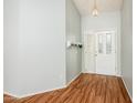 Charming entryway with coat rack and a full view of the front door from the interior at 1538 E Peach Tree Dr, Chandler, AZ 85249