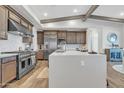 Spacious kitchen with stainless steel appliances, a large island, and stylish cabinetry at 21036 E Stacey Rd, Queen Creek, AZ 85142