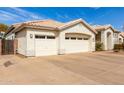 Spacious two-car garage with automatic doors and extra driveway parking at 2348 W Flint St, Chandler, AZ 85224