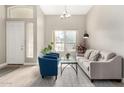 Bright living room with large windows, vaulted ceiling, and modern decor at 2348 W Flint St, Chandler, AZ 85224