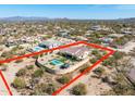 Aerial view of an estate lot property featuring a pool and cabana in a desert landscape setting at 30416 N 64Th Street --, Cave Creek, AZ 85331