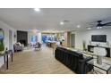 Open-concept living room flowing into the kitchen and dining area at 918 W Carmen St, Tempe, AZ 85283