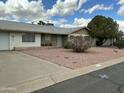 Charming single story home with desert landscaping and mature landscaping at 224 N 58Th St, Mesa, AZ 85205