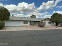 Charming single story home with desert landscaping and a spacious two car garage at 224 N 58Th St, Mesa, AZ 85205