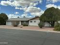 Charming single story home with desert landscaping and mature landscaping at 224 N 58Th St, Mesa, AZ 85205