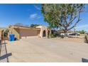 Single-story home with a spacious driveway and attached garage at 9022 N 39Th Ave, Phoenix, AZ 85051