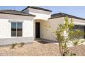 Charming single-story home with a well-maintained front yard and stucco exterior at 15901 S Saxon Rd, Arizona City, AZ 85123
