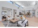 Spacious living room featuring modern decor, large windows, and an open-concept design at 4302 E Marion Way, Phoenix, AZ 85018