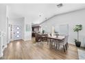 Well-lit dining area featuring modern pendant lights and an adjacent, stylish kitchen at 1525 W Mcnair St, Chandler, AZ 85224