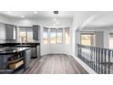 Bright eat-in kitchen featuring stainless steel appliances, granite countertops, and light-filled breakfast nook at 22236 N 48Th St, Phoenix, AZ 85054