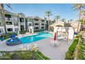 Beautiful community pool with lounging areas and ample seating for relaxation at 5303 N 7Th St # 109, Phoenix, AZ 85014