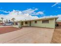 Inviting home with a spacious driveway and well-maintained exterior, perfect for Gathering living at 1238 E Barcelona Ave, Casa Grande, AZ 85122