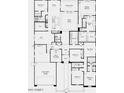 Spacious floor plan featuring an open-concept living area, multiple bedrooms, and a large 3-car tandem garage at 18868 E Celtic Manor Dr, Queen Creek, AZ 85142