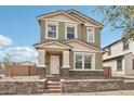 Two-story home featuring neutral stucco, well-maintained landscaping, and stylish architectural details at 1978 W Lariat Ln, Phoenix, AZ 85085