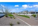 A paved walking path featuring desert landscaping and providing a scenic route through the community at 2333 E Marguerite Ave, Phoenix, AZ 85040
