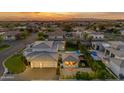 Aerial view of a home with a sparkling pool, spacious layout and neighborhood at 2742 W Monterey Pl, Chandler, AZ 85224