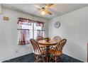 Cozy dining area featuring a wood table with seating for four at 5132 N 83Rd St, Scottsdale, AZ 85250