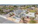 Aerial view of home featuring an attached garage, gated drive, and a second-story balcony at 5338 N 21St Ave, Phoenix, AZ 85015