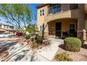 Charming home exterior featuring a landscaped front yard and covered entryway at 2821 S Skyline Dr # 107, Mesa, AZ 85212