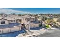 Spacious home with tile roof, three-car garage, and manicured landscaping in a quiet neighborhood at 4235 W Harrison St, Chandler, AZ 85226