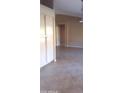 Spacious living room featuring neutral colors and tile flooring at 1306 W Charleston Ave, Phoenix, AZ 85023