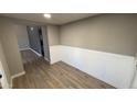 Cozy living room with light wood flooring and fresh gray paint at 4231 E Carter Dr, Phoenix, AZ 85042