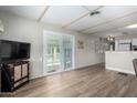 Inviting living room featuring a neutral color palette and sliding glass door at 2528 E Mckellips Rd # 74, Mesa, AZ 85213