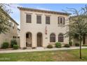 Charming two-story home with a well-manicured lawn and inviting curb appeal at 3518 S Posse Trl, Gilbert, AZ 85297