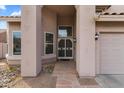 Close-up view of the front entrance showcasing stone accents and decorative security door at 4607 E Rancho Laredo Dr, Cave Creek, AZ 85331