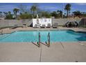 Inviting community pool with lounge chairs offers a relaxing outdoor space at 925 W Mcdowell Rd # 102, Phoenix, AZ 85007